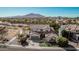 Beautiful suburban home with lush landscaping, tile roof, and a mountain view at 3529 E Fandango Dr, Gilbert, AZ 85298