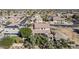 An aerial view of the home, backyard with trees, and the surrounding community at 3529 E Fandango Dr, Gilbert, AZ 85298