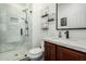 Beautiful bathroom with marble tiled shower, floating shelves, and modern fixtures at 3529 E Fandango Dr, Gilbert, AZ 85298