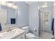 Charming bathroom with vintage fixtures, a framed mirror and unique tiling at 401 E Marconi Ave, Phoenix, AZ 85022