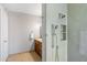 Clean bathroom with a tiled shower featuring dual shower heads and a built-in niche at 401 E Marconi Ave, Phoenix, AZ 85022