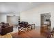Open-concept space showing living, dining and kitchen areas with great flow and natural light at 401 E Marconi Ave, Phoenix, AZ 85022