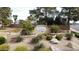 Entrance to Paradise Manor with lush desert landscaping, showcasing a welcoming neighborhood at 5123 E Beck Ln, Scottsdale, AZ 85254