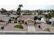Charming single-story home with a well-kept front yard, desert landscaping, and a two-car garage at 5123 E Beck Ln, Scottsdale, AZ 85254