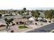 Charming single-story home with desert landscaping, palm trees and a two-car garage, showcasing curb appeal at 5123 E Beck Ln, Scottsdale, AZ 85254