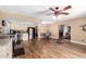 Spacious kitchen featuring stainless steel appliances, wood flooring, and ample natural light at 5123 E Beck Ln, Scottsdale, AZ 85254