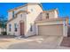Charming two-story home featuring a two-car garage and well-maintained front yard at 5145 W Odeum Ln, Phoenix, AZ 85043