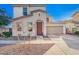 A charming single-Gathering home showcases an attached garage and desert landscaping in a sunny neighborhood at 5145 W Odeum Ln, Phoenix, AZ 85043