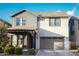 Charming two-story home with a gray garage door and well-kept landscaping at 632 W Springfield Pl, Chandler, AZ 85286