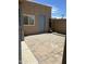 Private backyard patio featuring pavers and a punching bag at 6943 W Devonshire Ave # 1355, Phoenix, AZ 85033