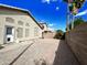 Backyard features brick-paver patio area with a low-maintenance desert landscape, walled for privacy at 723 E Whitten St, Chandler, AZ 85225