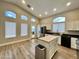 Bright kitchen with stainless steel appliances and butcher block island at 723 E Whitten St, Chandler, AZ 85225