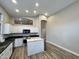 Well-lit kitchen featuring a butcher block island, sleek countertops, and ample cabinet space at 723 E Whitten St, Chandler, AZ 85225