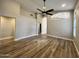 Open concept living room with modern flooring and open archways at 723 E Whitten St, Chandler, AZ 85225