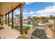Inviting backyard with a pool, patio area, and garden, perfect for outdoor living and entertaining at 8540 E Mcdowell Rd # 125, Mesa, AZ 85207