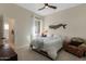 Cozy bedroom with a comfortable bed, whale decoration, and a charming chair, creating a relaxing space at 8540 E Mcdowell Rd # 125, Mesa, AZ 85207