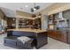 Well-appointed kitchen with granite countertops, custom cabinets, and modern stainless steel appliances at 8540 E Mcdowell Rd # 125, Mesa, AZ 85207