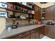 This stylish kitchen features custom cabinets, open shelving and sleek countertops, perfect for any home chef at 8540 E Mcdowell Rd # 125, Mesa, AZ 85207