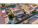 Overhead view of a home's yard with a pool, barbeque, artificial turf, and desert landscaping at 9013 S 15Th Way, Phoenix, AZ 85042