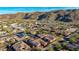 Beautiful aerial view of a peaceful community surrounded by desert landscape and the stunning mountain range at 9013 S 15Th Way, Phoenix, AZ 85042
