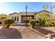 Well-maintained backyard with low-maintenance landscaping, a covered patio, and ample space for outdoor activities at 9013 S 15Th Way, Phoenix, AZ 85042