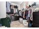 This closet features built-in shelving and ample space for storage at 9013 S 15Th Way, Phoenix, AZ 85042