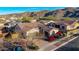 Exterior home view showcasing desert landscaping, tile roof, and a charming single-story design at 9013 S 15Th Way, Phoenix, AZ 85042