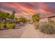 Neighborhood walking path bordered by mature trees and bushes at 9751 E Impala Ave, Mesa, AZ 85209