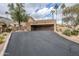 Long driveway leading to garage and home at 10432 N 7Th Pl # 1, Phoenix, AZ 85020