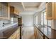 Updated kitchen with new stainless appliances, sleek countertops, and a convenient breakfast bar at 10432 N 7Th Pl # 1, Phoenix, AZ 85020