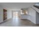 Open-concept living space with sleek flooring and sliding glass doors, perfect for modern living at 10432 N 7Th Pl # 1, Phoenix, AZ 85020