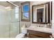 Bathroom featuring a glass shower, attractive sink, and a view at 10902 N 138Th Pl, Scottsdale, AZ 85259
