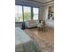 Bedroom sitting area featuring an abundance of natural light and comfortable sofa at 10902 N 138Th Pl, Scottsdale, AZ 85259