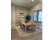 Well lit dining room with neutral colors, hardwood floors, and six chairs at 10902 N 138Th Pl, Scottsdale, AZ 85259