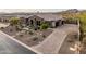 Stunning home exterior with well-manicured landscaping and a paved driveway, perfect curb appeal at 10902 N 138Th Pl, Scottsdale, AZ 85259
