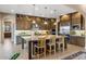 Gourmet kitchen with granite countertops, stainless steel appliances, and custom cabinetry at 10902 N 138Th Pl, Scottsdale, AZ 85259