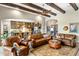 Open floor plan featuring exposed beams connecting the living room and kitchen at 10902 N 138Th Pl, Scottsdale, AZ 85259