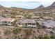 Aerial view of the backyard featuring desert landscaping, patio and swimming pool at 10902 N 138Th Pl, Scottsdale, AZ 85259