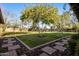 Lush backyard with mature landscaping, offering a serene and private outdoor space at 11021 N 74Th St, Scottsdale, AZ 85260