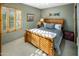 Light-filled bedroom with wood shutters offering plenty of sunshine at 11021 N 74Th St, Scottsdale, AZ 85260