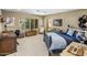 Comfortable bedroom featuring a decorative bed and window with natural light at 11021 N 74Th St, Scottsdale, AZ 85260