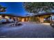 Home featuring a charming courtyard with a water fountain and an expansive paver driveway at 11021 N 74Th St, Scottsdale, AZ 85260