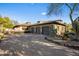 Multi car garage with brick paved driveway and desert landscaping at 11021 N 74Th St, Scottsdale, AZ 85260