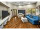 Casual living area with French doors, chalkboard wall, and comfortable seating at 11021 N 74Th St, Scottsdale, AZ 85260