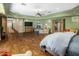Spacious main bedroom with hardwood floors, fireplace, and an alcove sitting area at 11021 N 74Th St, Scottsdale, AZ 85260