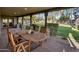 Covered patio with comfortable seating, ideal for outdoor dining and entertaining at 11021 N 74Th St, Scottsdale, AZ 85260