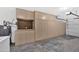 Organized garage featuring built-in cabinets, providing ample storage and maximizing space at 1108 E Villa Rita Dr, Phoenix, AZ 85022