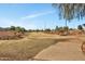 Scenic park with a vast green field, mature trees, and a walking path, creating a tranquil outdoor setting at 1108 E Villa Rita Dr, Phoenix, AZ 85022