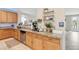 Kitchen counter with stainless steel appliances, granite countertops, and ample cabinet space at 11933 N 140Th Ln, Surprise, AZ 85379