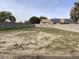 Backyard showcasing an empty lot with potential for new construction at 14930 N Gil Balcome Ct, Surprise, AZ 85379